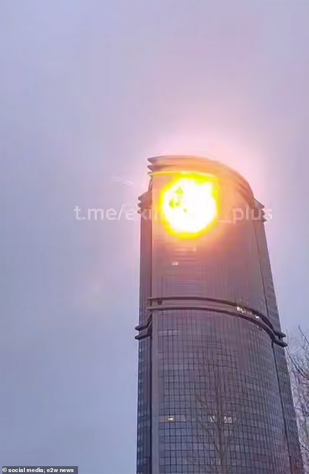 It crashed into the side of the 121m Lazurnyye Nebesa tower and exploded in a fireball.