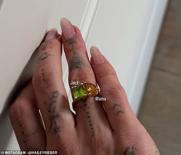 She took to her Instagram Story as she shared a photo of herself modeling a custom ring adorned with her birthstone, a topaz, and her newborn son Jack's stone, a peridot.