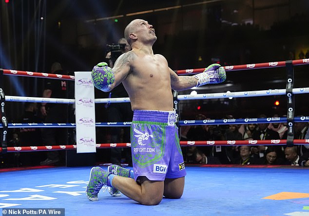 After the final bell, Ukrainian star Usyk knelt and looked up at the sky.