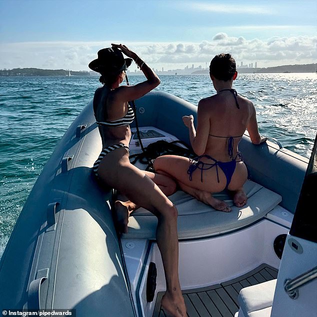 'Summer days aboard Poppy's (Pippy's),' she captioned the series of photos, which showed her sunbathing with her friends.