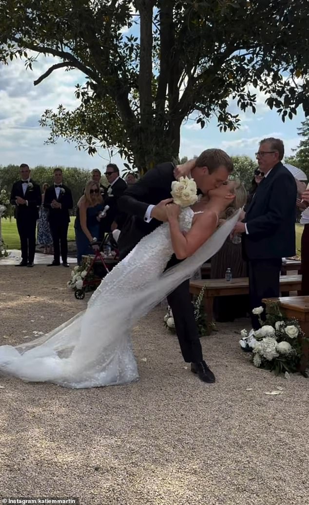 The couple tied the knot outdoors in the New South Wales wine country and the bride looked stunning in a dress by designer Mosman Marry Me Bridal.