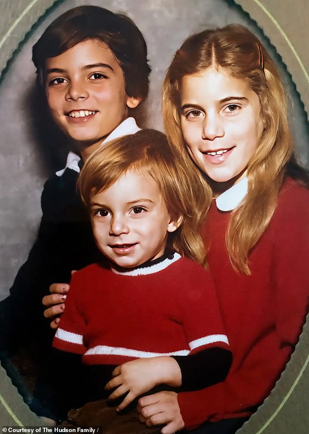 Melina Hudson poses for a photo with her brother Stephen and Paul Joseph