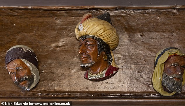 Inside one corner of the Kings Langley pub, with its oak beams and low ceilings, is a fireplace with half a dozen ornaments depicting a Saracen's head.