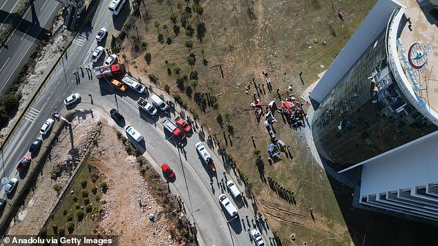 An aerial view of the helicopter landing site and the hospital building.