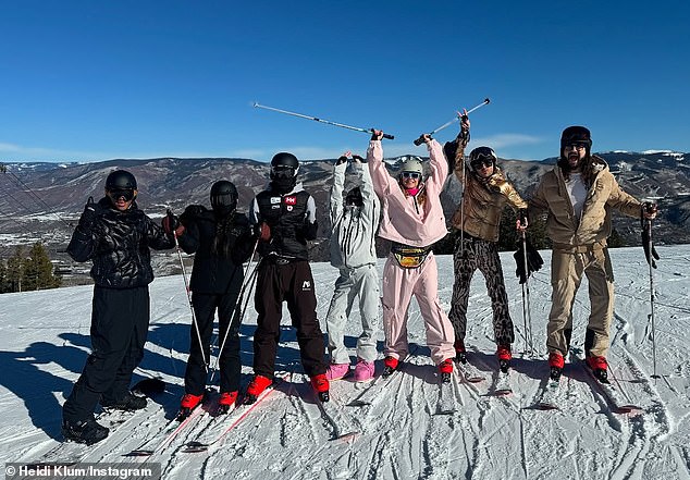 Heidi wore the exact same snowsuit on Saturday when she took a family photo at the summit.