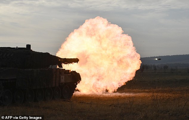 Ukrainian Ground Forces fire a Leopard 2A4 tank during field training at an undisclosed location in Ukraine, Oct. 27.