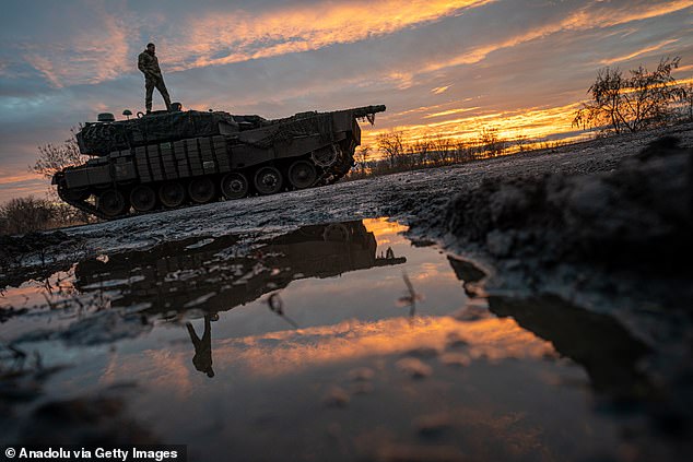 Ukrainian servicemen from the 33rd Brigade operate a Leopard battle tank heading towards Kurahove, Ukraine, as the war between Russia and Ukraine continues on December 19.