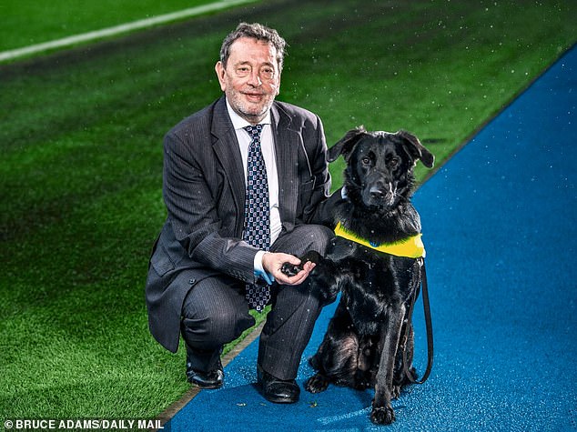 David Blunkett, a Labor peer and former home secretary, said he was boarding a District line train on the Westminster Tube last month with his seeing-eye dog (pictured with Barley) when his feet slipped