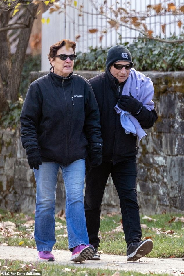 Fauci was spotted taking a walk with his wife Christine this weekend without any security detail