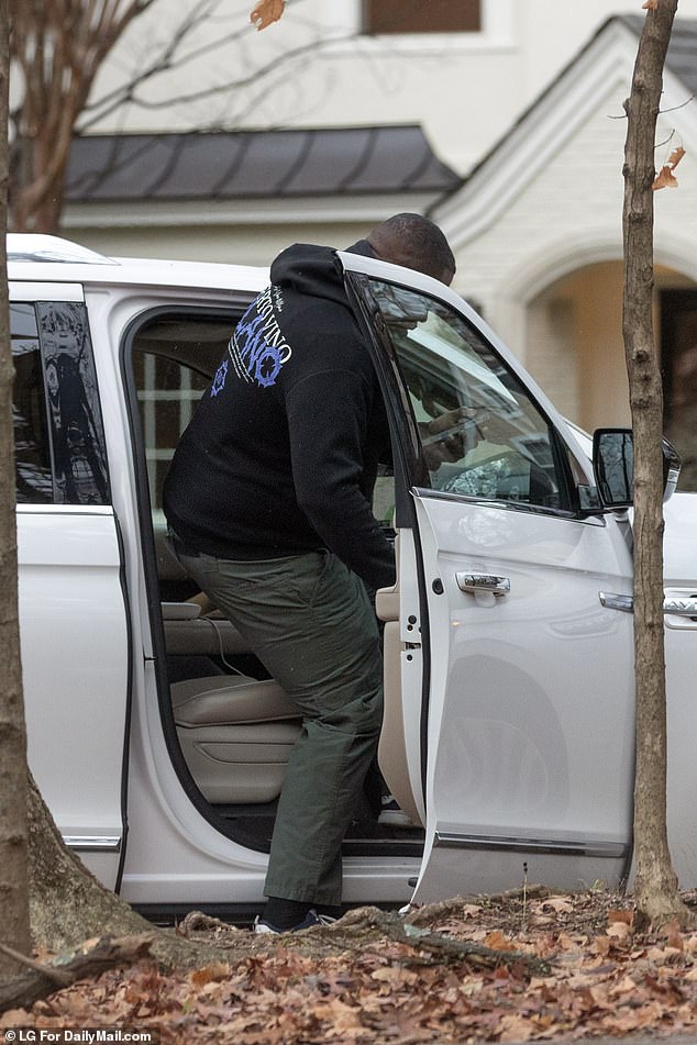 They huddled together after an outing with Fauci before leaving in a white SUV