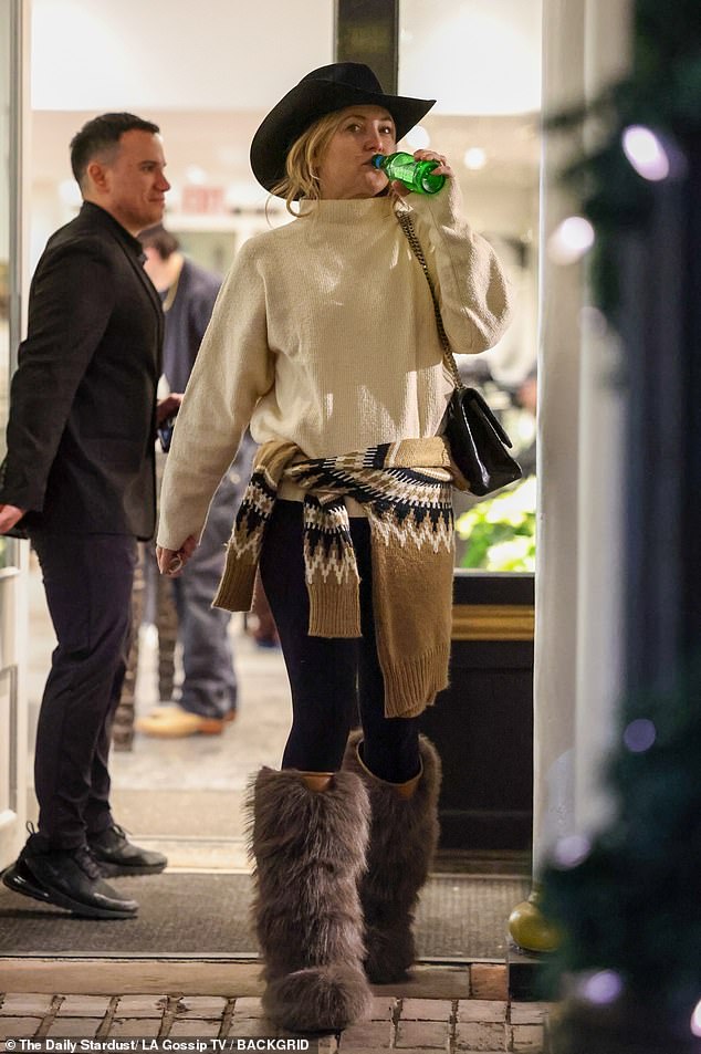 Kate, 45, was seen shopping for gifts at Chrome Hearts in a chic cowgirl outfit that included a hat and furry boots.