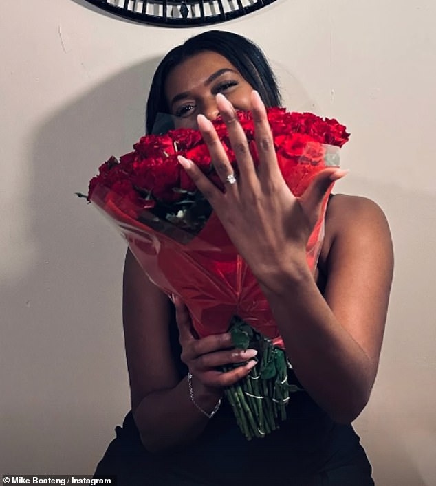 He shared a series of snapshots, but did not reveal the identity of his now fiancée, as she hid her face behind a beautiful purchase of red roses while showing off the sparkler in her left hand.