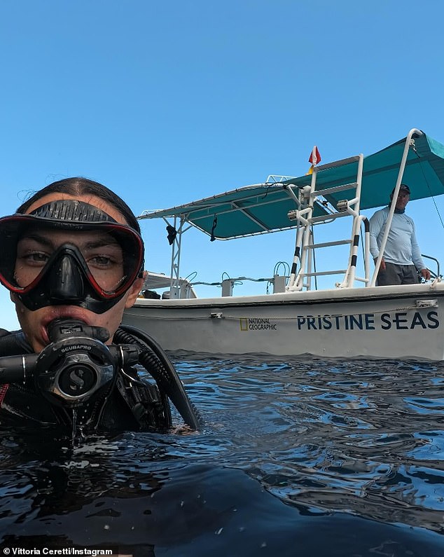 She also shared photos of her getting ready to dive.