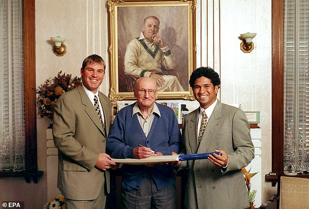 Bradman, pictured with Shane Warne and Sachin Tendulkar, canceled an Australian tour of South Africa when he was president of the Australian Cricket Board in 1970.