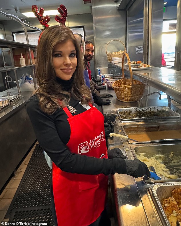 D'Errico wrote to her 2.9 million Instagram followers: 'Thank you to @thelamission for allowing me to volunteer these past few years. Today we serve hundreds of Christmas meals to many, many lovely people who are down on their luck.