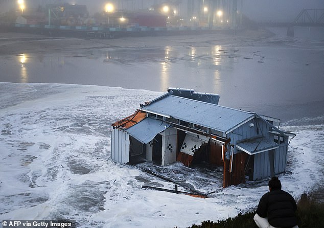 The Dolphin Restaurant and the bathrooms on the edge of the quay were sent into the water