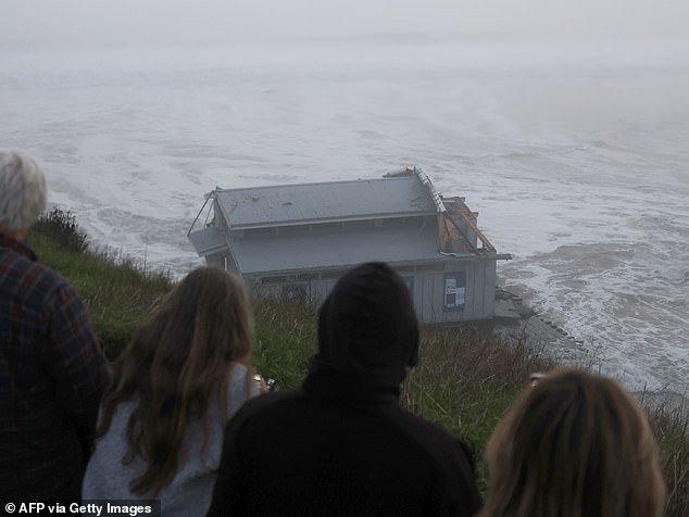 Stunned onlookers watched as the structures floated away