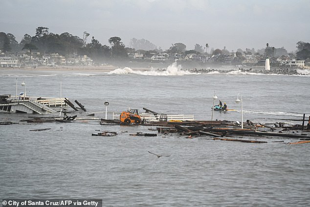 A crane and a skid steer were also seen adrift in the ocean, as well as driftwood and street lamps