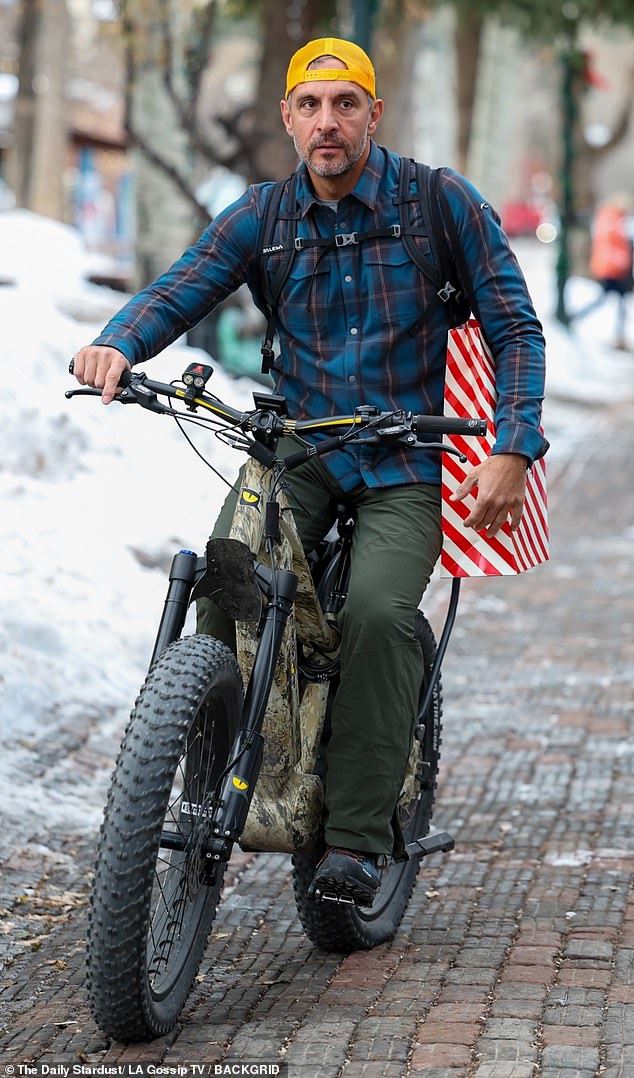 Kyle's ex-spouse, Mauricio Umansky, 54, took to the city streets on a camouflage fat bike.