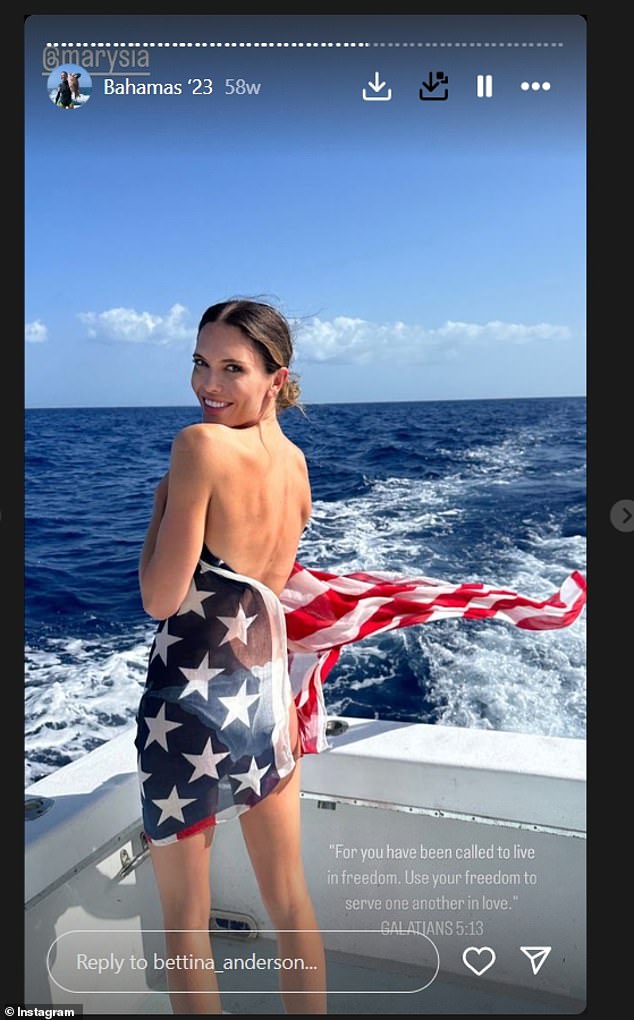 Florida socialite Bettina Anderson on a boat wrapped in an American flag