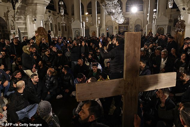 Hundreds of protesters took to the streets in Christian areas of Damascus early on December 24.