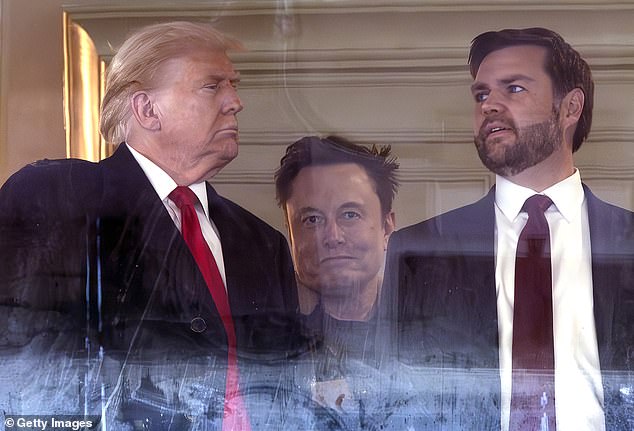 Musk stands behind Trump and Vice President-elect JD Vance during the Army-Navy matchup on December 14