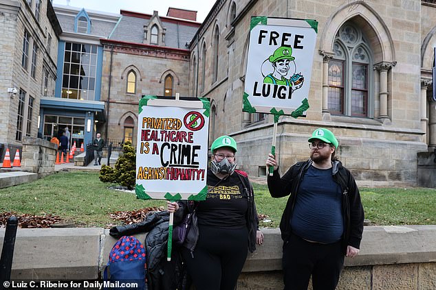 Protesters showed up outside a courthouse in Pennsylvania on Thursday to support Mangione