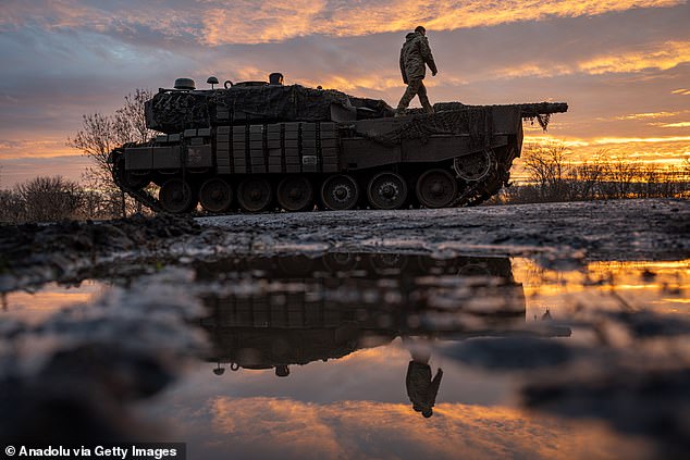 Ukrainian servicemen from the 33rd Brigade operate a Leopard battle tank heading towards Kurahove, Ukraine, as the war between Russia and Ukraine continues on December 19, 2024.