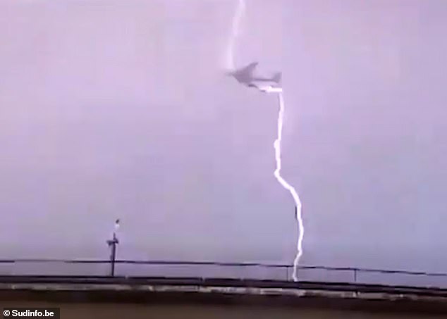 This is the terrifying moment a plane was struck by lightning shortly after takeoff in Belgium on Sunday