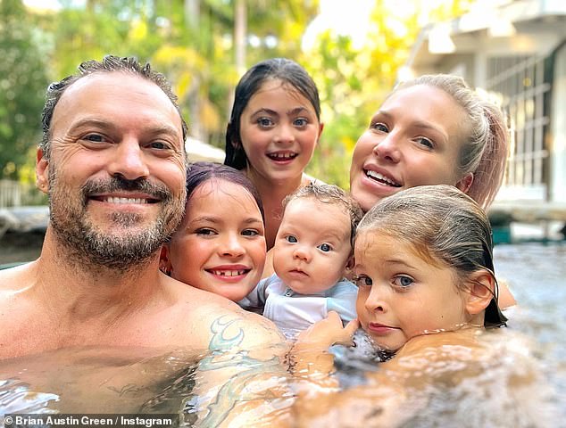 Brian Austin Green, 50, is father to Noah, 11, Bodhi, nine, and Journey, seven, with Megan. He has a two-year-old son, Zane, with Sharna Burgess, 39 (pictured all together here).