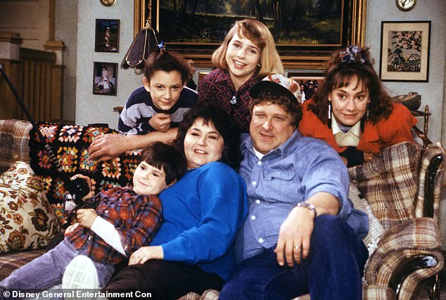 Gilbert (above left) appears on Roseanne in 1989 with co-stars Lecy Goranson, Laurie Metcalf, Michael Fishman, Roseanne Barr and John Goodman.