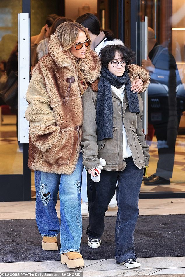 Jennifer looked warm and cozy as she stepped out of a Gucci store wearing a thick, furry brown coat with a high collar turned up as she wrapped her arm around Emme.