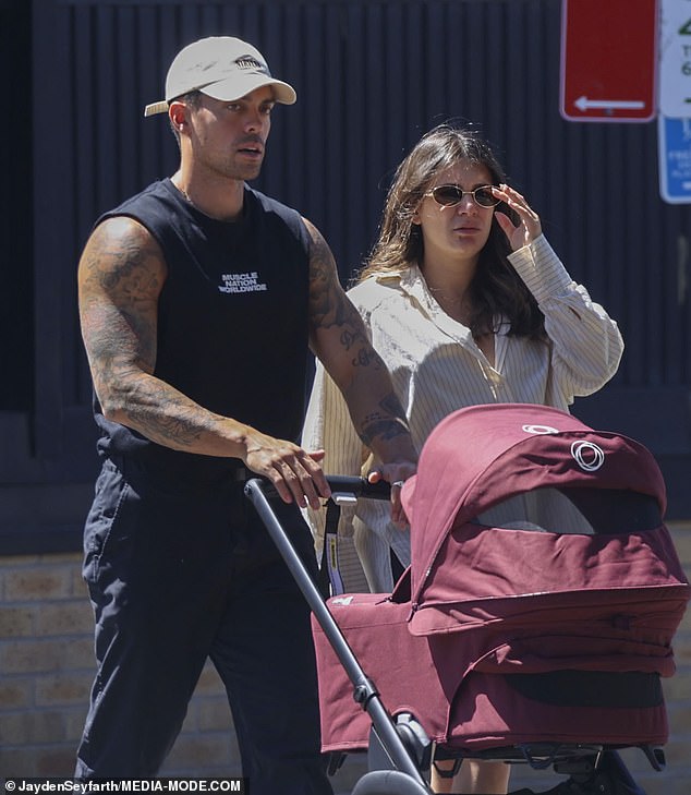 The couple appeared to be embracing parenthood with passion and enthusiasm, as they enjoyed their sunny day.