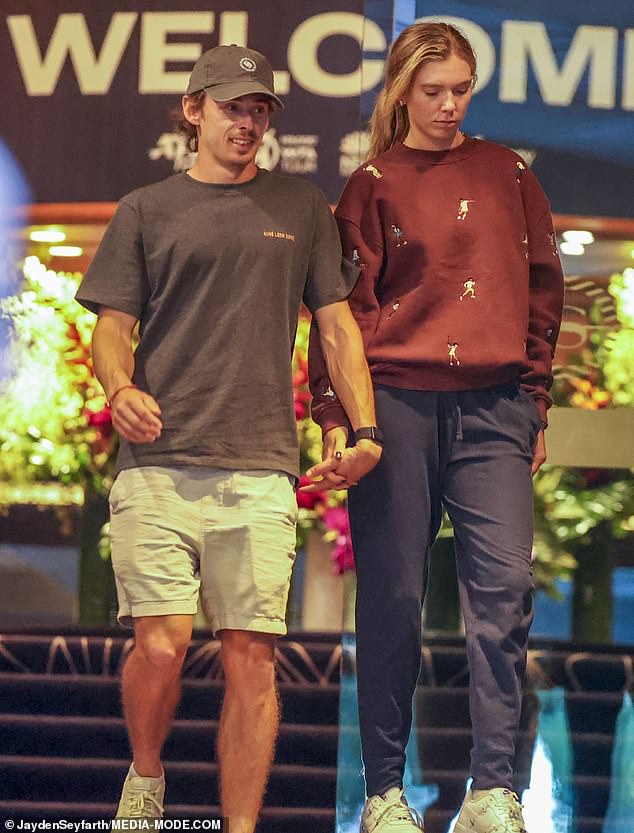 Alex De Minaur walked in step with Katie Boulter as the lovebirds remained glued to each other.