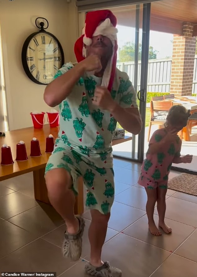 The cricket legend, 38, shared a fun video on Instagram that captured him dancing up a storm with his daughters while sporting bright green Christmas-themed pajamas.