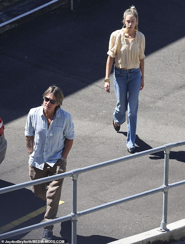 The family (Keith and Sunday are pictured) spent Christmas morning at the same church where Nicole's mother Janelle's funeral was held in September.