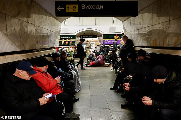 People take shelter in a subway station during an airstrike alert, amid Russia's attack on Ukraine, in kyiv, Ukraine, December 25, 2024.