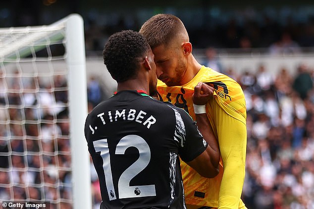 Jurrien Timber and Guglielmo Vicario face off during the North London derby in September