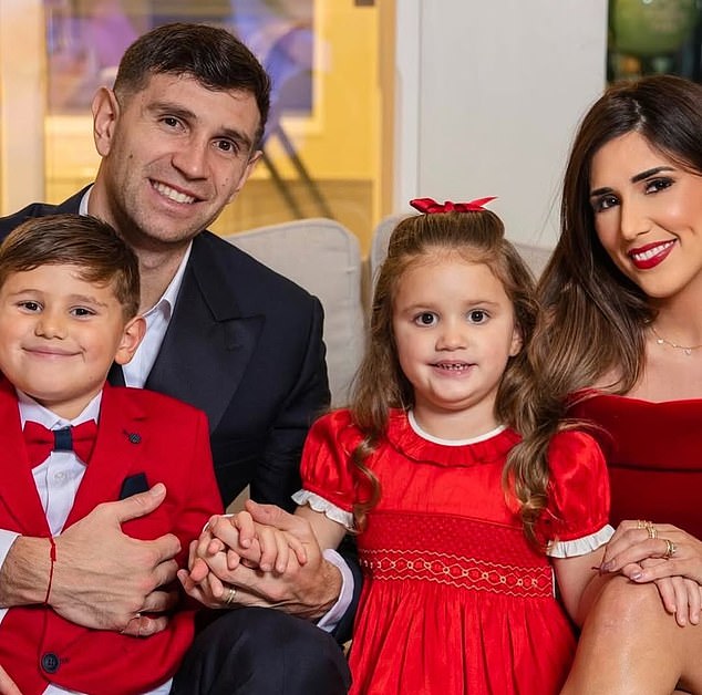 Emiliano Martínez, for his part, sat with his wife Amanda and the couple's two children.