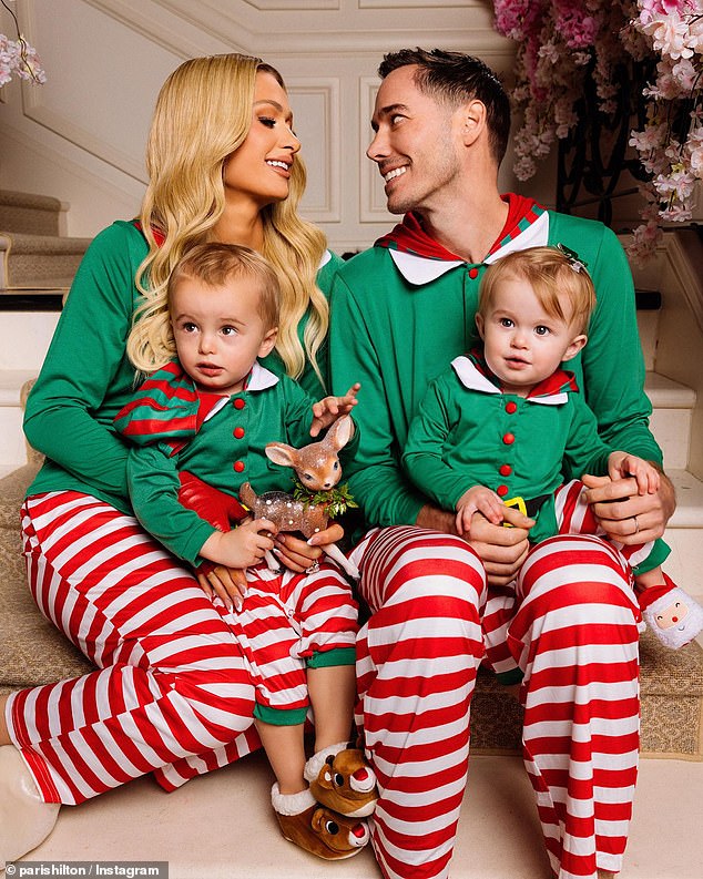 Another post showed her wearing matching pajamas with her husband Carter Reum and their two children, Phoenix, 23 months, and London, 13 months.