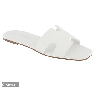 Kmart's cutout slides (pictured) look strikingly similar to Hermès' iconic $1,295 Oran sandals.