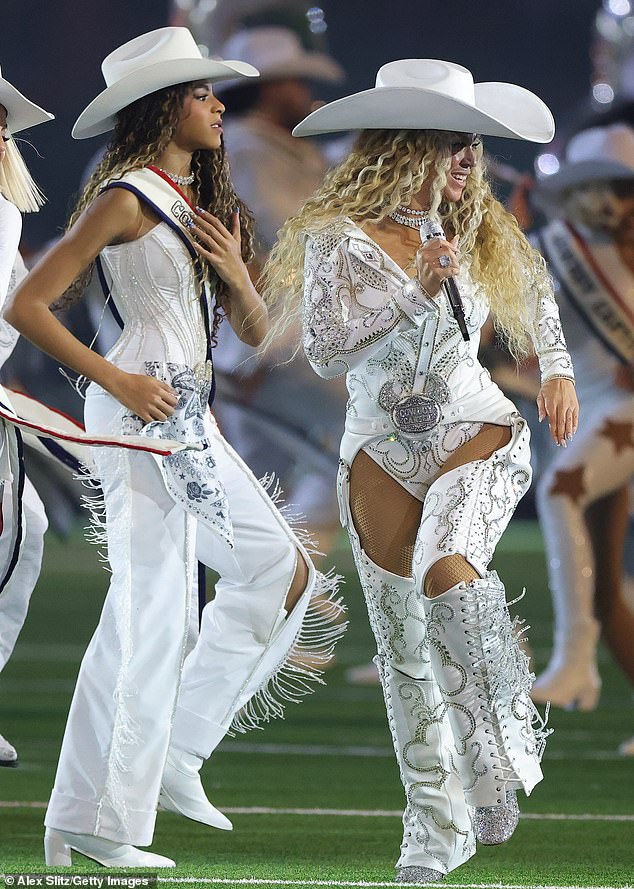 Blue coordinated with Beyoncé in all-white western wear while serving as a backup dancer for the climactic and closing number - Texas Hold 'Em