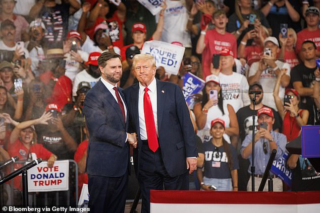 Vance will be the youngest vice president since Richard Nixon, who served two terms under Dwight Eisenhower starting in 1953. He is seen with Donald Trump in August 2024.