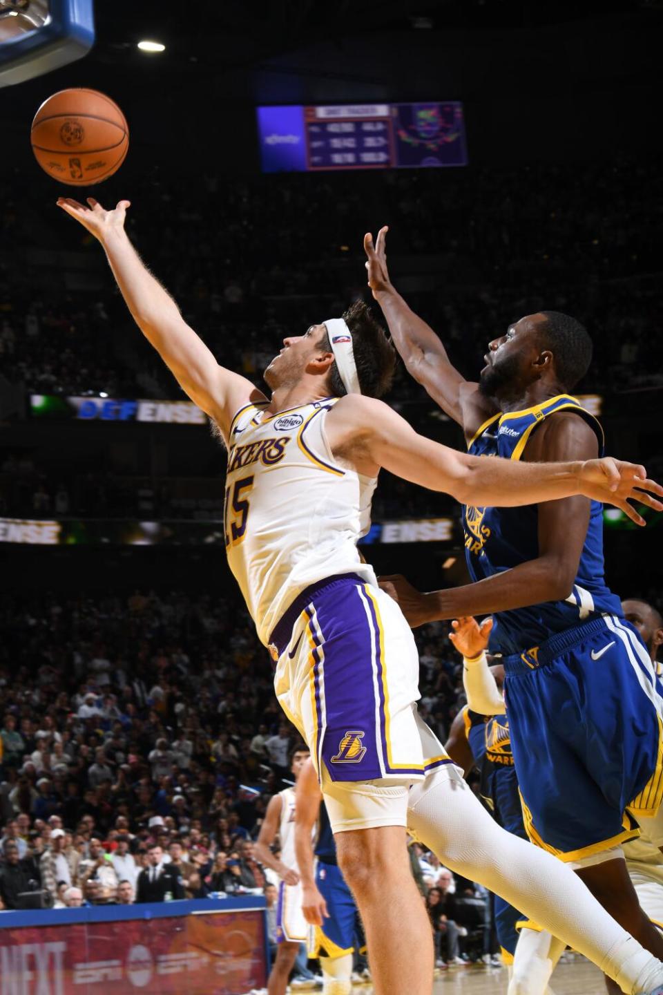 Lakers guard Austin Reaves scores the winning basket during a 115-113 victory over the Warriors on Wednesday.