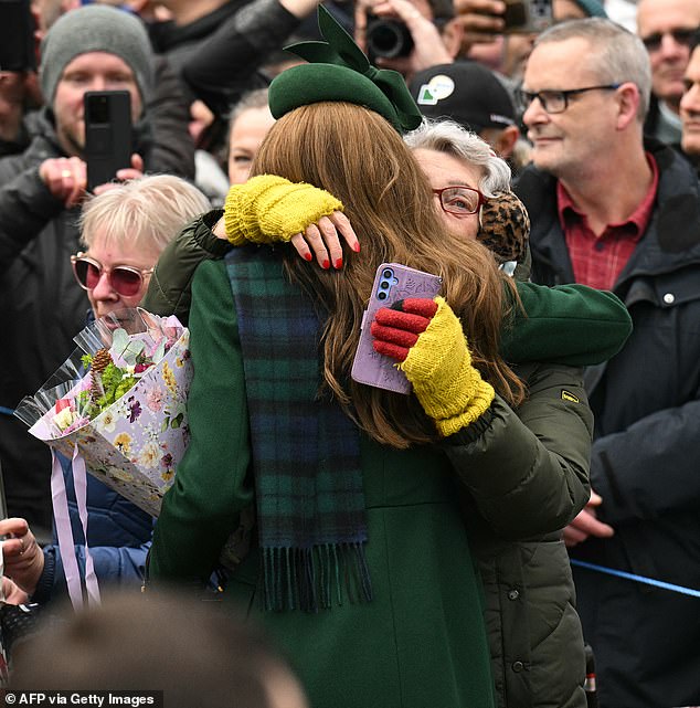 The Princess of Wales hugged a cancer patient (pictured) after a Christmas Day church service on Wednesday.