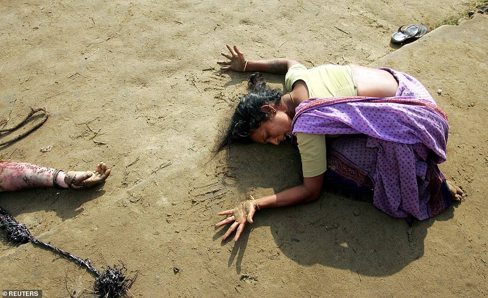 This photo of an Indian woman mourning the death of a relative killed in the Boxing Day tsunami won first prize in the World Press Photo competition that same year