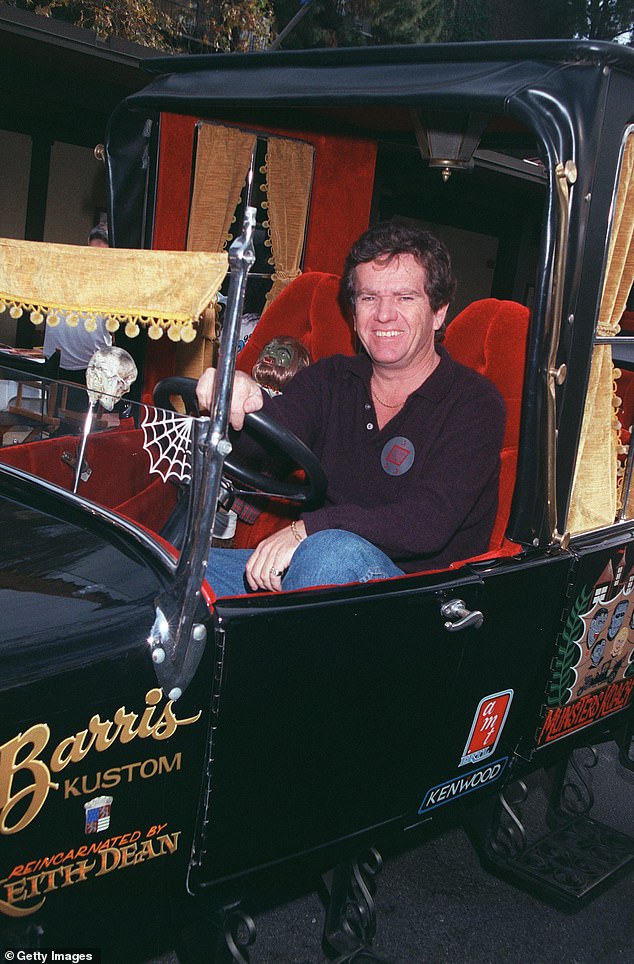 Patrick poses with the Munster Mobile at the Hollywood Collectors and Celebrity Show held at the Beverly Garland Holiday Inn in 2001 in North Hollywood, California.