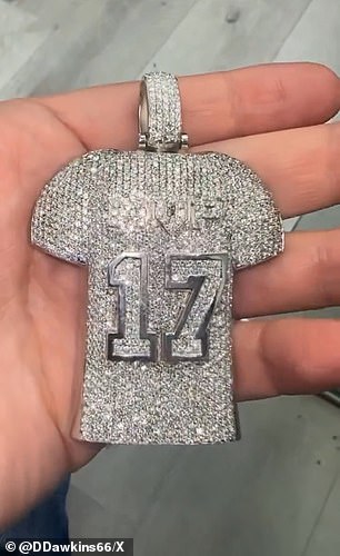 The diamond-covered locket features Allen's number, 17