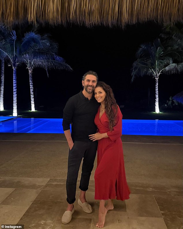 In one of the other snaps, Eva snuggled up to her handsome husband by the pool while donning a red midi dress while her dark locks cascaded over her shoulders.