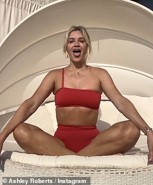 Ahead of Christmas, the Heart Radio presenter looked incredible as she showed off her chiseled abs in a red bikini while meditating in the sun.